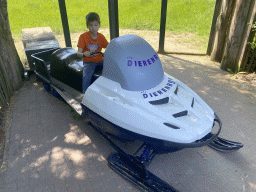 Max on a snowmobile in front of the Polar Bear enclosure at the Dierenrijk zoo