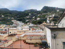 Rooftops, the tower of the Basilica di Santa Trofimena church and buildings at the town center, viewed from the staircase from the Via Alfonso Gatto street to the Via Caruseillo street