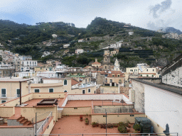 Rooftops, the tower of the Basilica di Santa Trofimena church and buildings at the town center, viewed from the staircase from the Via Alfonso Gatto street to the Via Caruseillo street