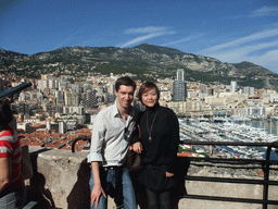 Tim and Miaomiao with the skyline of Monte Carlo and the Port Hercule harbour, viewed from the Place du Palais square