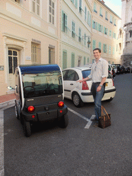 Tim with small car at the Rue de l`Abbaye street