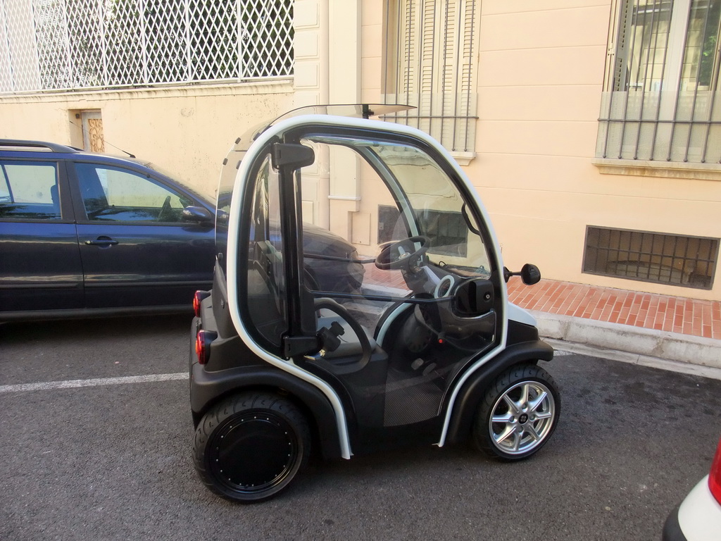 Small car at the Rue de l`Abbaye street