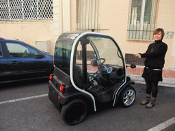 Miaomiao with small car at the Rue de l`Abbaye street