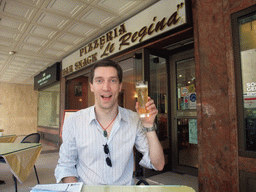 Tim with beer at pizzeria `Le Regina`