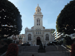 Statue and front of the Église Saint-Charles