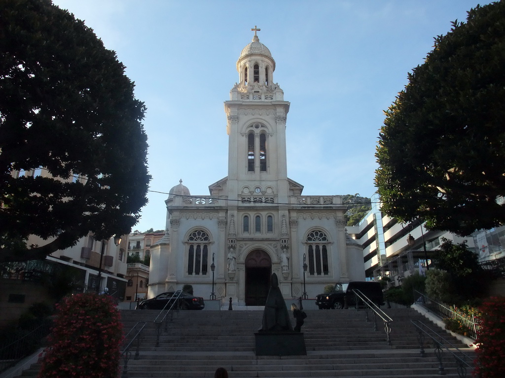 Statue and front of the Église Saint-Charles