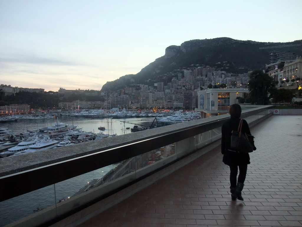 Miaomiao at the roof of the Fairmont Monte Carlo Hotel, with a view on the skyline of Monte Carlo and the Port Hercule harbour