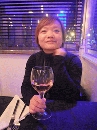Miaomiao with wine in our dinner restaurant `Miramar`