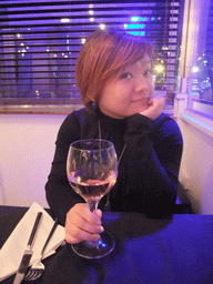 Miaomiao with wine in our dinner restaurant `Miramar`