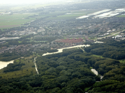 The Amsterdam Forest, the Kleine Poel lake and the Bovenkerk neighbourhood of the city of Amstelveen, viewed from the airplane from Amsterdam