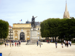 Equestrian statue of King Louis XIV at the Promenade du Peyrou, the Porte du Peyrou arch and the tower of the Église Sainte Anne church