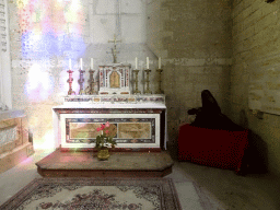 Side chapel with altar and statue at the right side of the Montpellier Cathedral