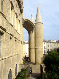 Side towers of the Montpellier Cathedral, viewed from the entrance to the Faculty of Medicine of the University of Montpellier at the Rue de l`École de Médecine street
