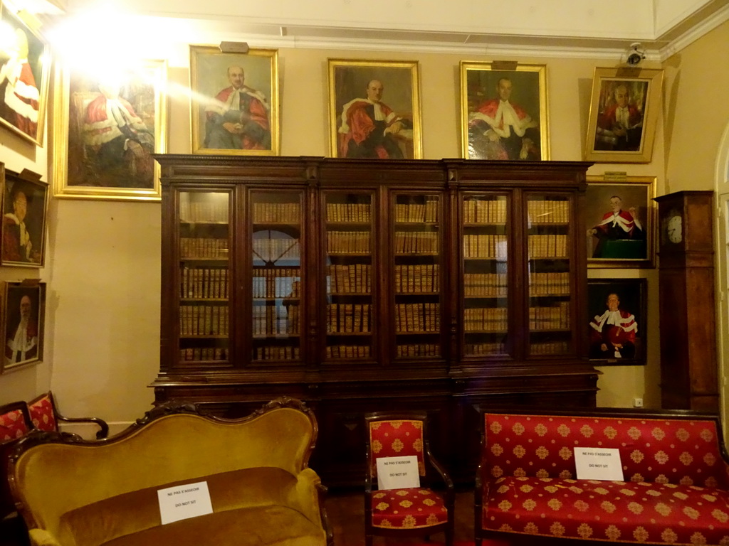 Portraits, books and chairs in the room next to the Anatomical Theatre of the Faculty of Medicine of the University of Montpellier