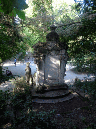 Back side of a statue and path at the north side of the Jardin des Plantes gardens, viewed from Richer`s Mountain