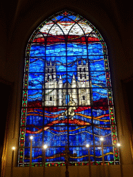 Stained glass window of St. Roch walking with his dog to the Montpellier Cathedral, at the apse of the Église Saint Roch church