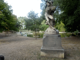Statue and the Bassin du Champs de Mars pond at the Esplanade Charles-de-Gaulle park