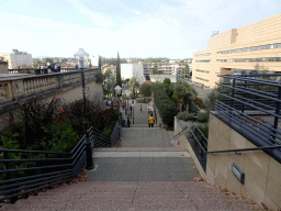 Staircase at the west side of the Corum conference center at the Allée du Saint-Esprit street