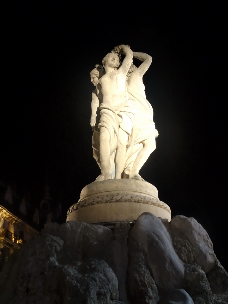 The Three Graces Fountain at the Place de la Comédie square, by night