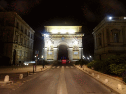 Front of the Porte du Peyrou arch at the Rue Foch street, by night