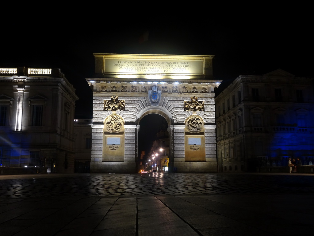 Back side of the Porte du Peyrou arch at the Rue Foch street, by night