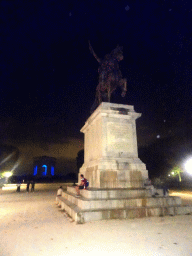 Equestrian statue of King Louis XIV and the Pavillon du Peyrou pavillion at the Promenade du Peyrou, by night
