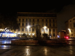 Fountain at the Place du Marché aux Fleurs square, by night