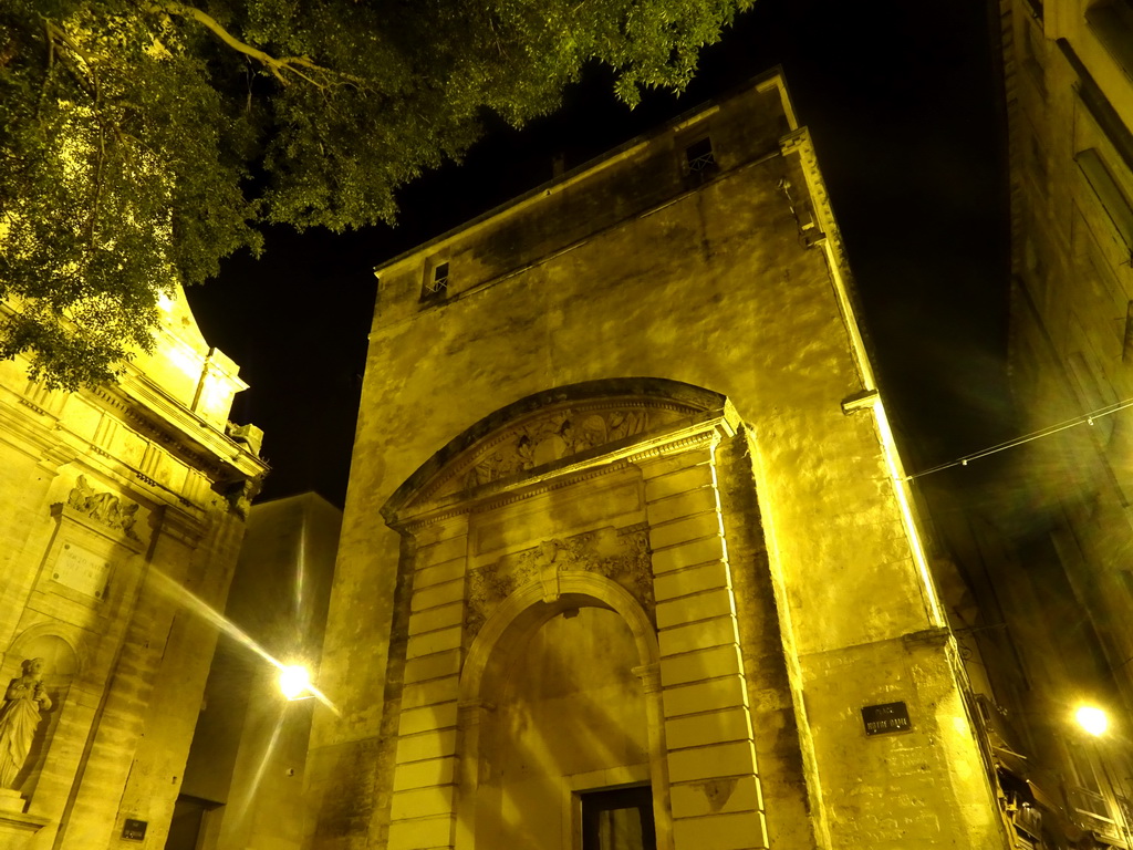 Facade of a building at the Rue de l`Aiguillerie street, by night