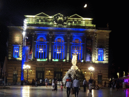 The Three Graces Fountain and the front of the Opéra National de Montpellier at the Place de la Comédie square, by night