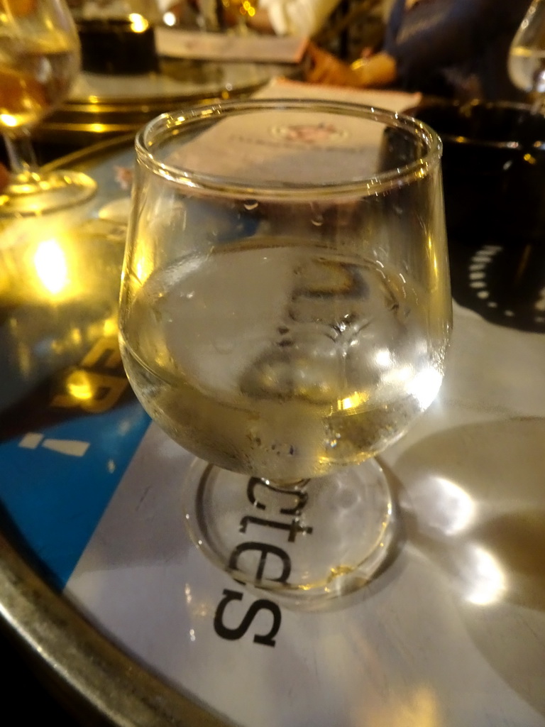 Liquor at the terrace of the Bouchon Saint Roch restaurant at the Rue du Plan d`Agde street, by night