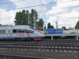 Train at the train platform of Vishnyi Volochek Railway Station, viewed from the high speed train from Saint Petersburg