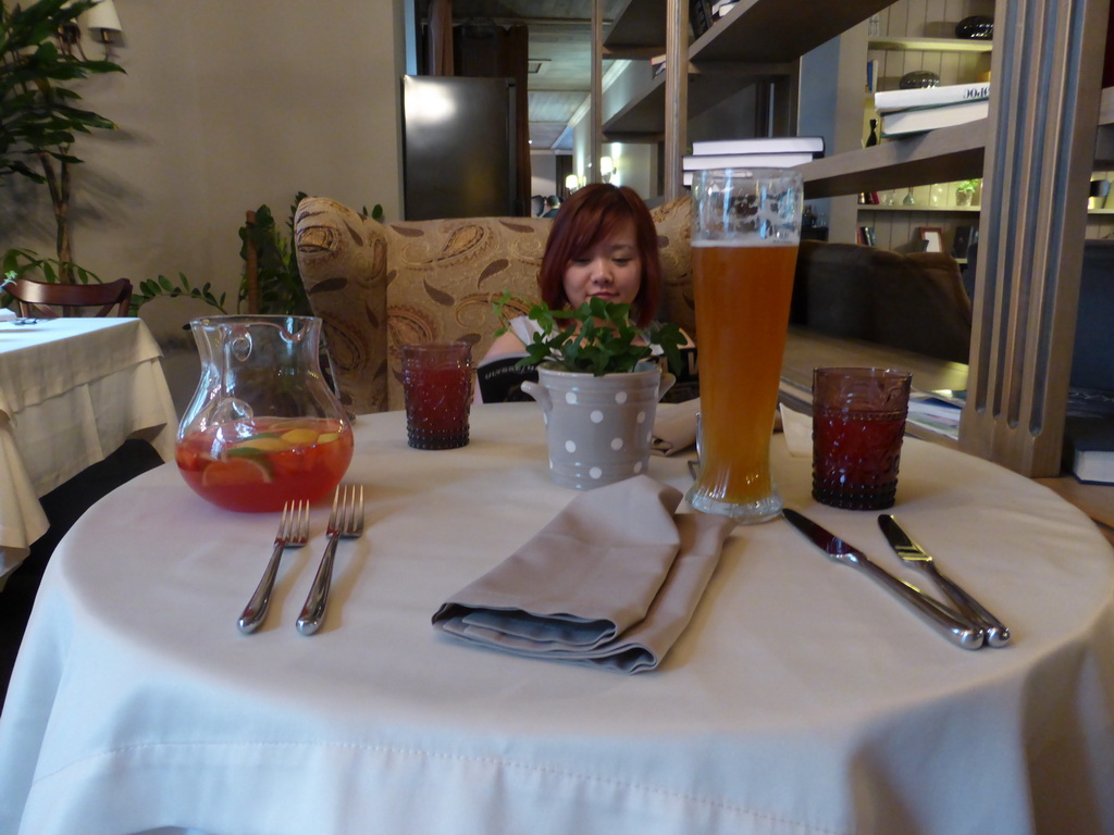 Miaomiao with sangria and a Paulaner beer at a restaurant at the Zubovsky boulevard