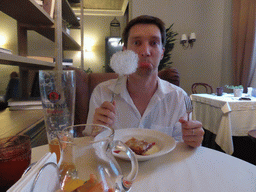 Tim with dessert and a Paulaner beer at a restaurant at the Zubovsky boulevard