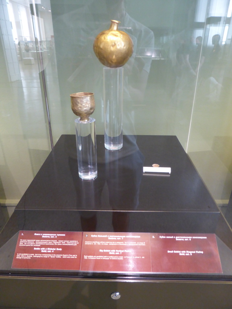 Bottle and goblet, part of Priam`s Treasure, at Room 3: Ancient Troy and Schliemann`s excavations at the Ground Floor of the Pushkin Museum of Fine Arts, with explanation