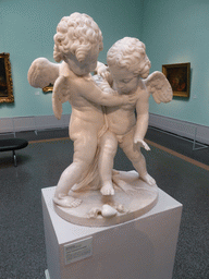 Statue `Cupids Fighting for a Human Heart` by the Broche brothers, at Room 22: French Art of the first half of the 18th century at the First Floor of the Pushkin Museum of Fine Arts