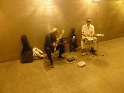 Street musicians in a tunnel at the Polyanka subway station