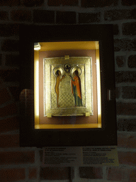 Piece of art `St. Vasily the Blessed and Holy Great Martyr St. Irene of Thessaloniki`, with explanation, at the Basement of Saint Basil`s Cathedral