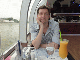 Tim with a drink at the tour boat on the Moskva river