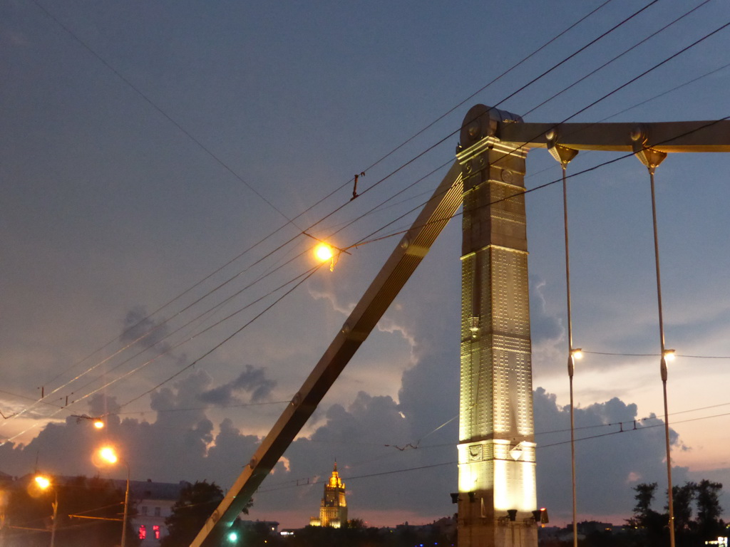 The Krymsky Bridge over the Moskva river and the Ministry of Foreign Affairs building, by night