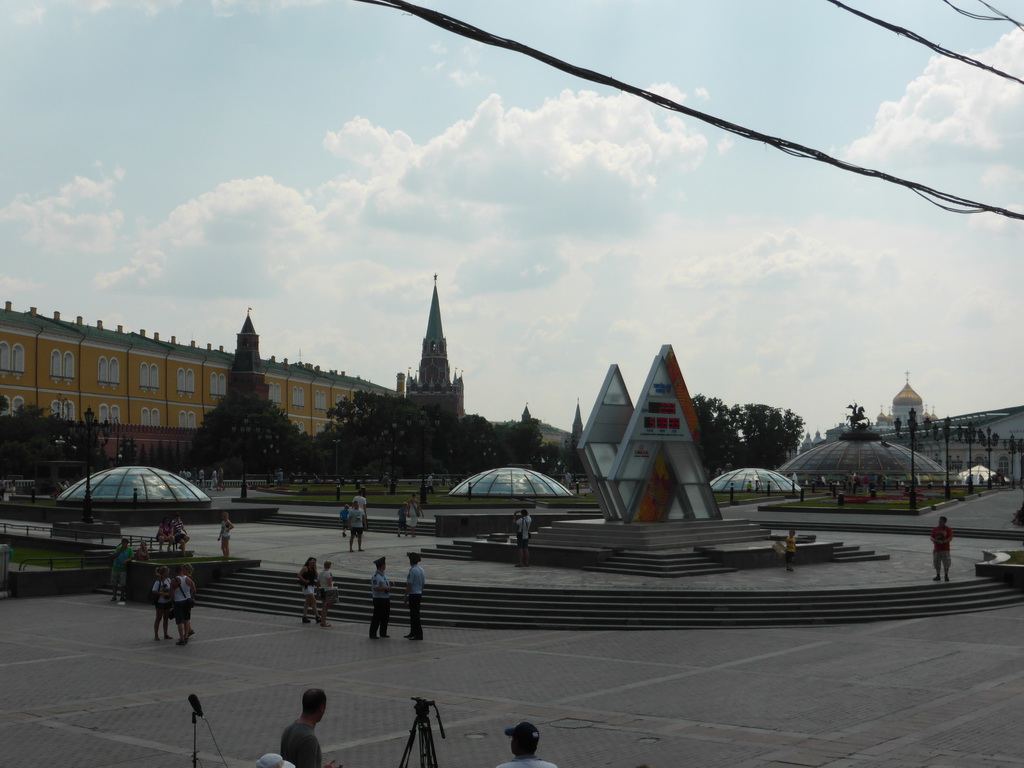 Manege Square with the Moscow Kremlin, a clock counting down to the Olympics 2014 in Sochi and the Cathedral of Christ the Saviour, viewed from the sightseeing bus