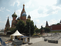 The Red Square with the front of Saint Basil`s Cathedral, the Monument to Minin and Pozharsky and the Moscow Kremlin, viewed from the sightseeing bus