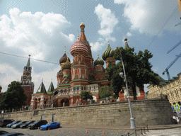 The back side of Saint Basil`s Cathedral and the Spasskaya Tower at the Moscow Kremlin, viewed from the sightseeing bus at Vasilyevskiy Spusk Square