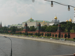 The Moskva river and the south side of the Moscow Kremlin with the Grand Kremlin Palace, the Cathedral of the Annunciation and the Cathedral of the Archangel Michael, viewed from the sightseeing bus at the Bolshoy Moskvoretsky Bridge