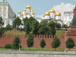 The Cathedral of the Annunciation and the Cathedral of the Dormition of the Moscow Kremlin, viewed from the sightseeing bus at the Sofiyskaya street