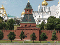 The Taynitskaya Tower, the Cathedral of the Annunciation, the Cathedral of the Archangel Michael and the Cathedral of the Dormition of the Moscow Kremlin, viewed from the sightseeing bus at the Sofiyskaya street