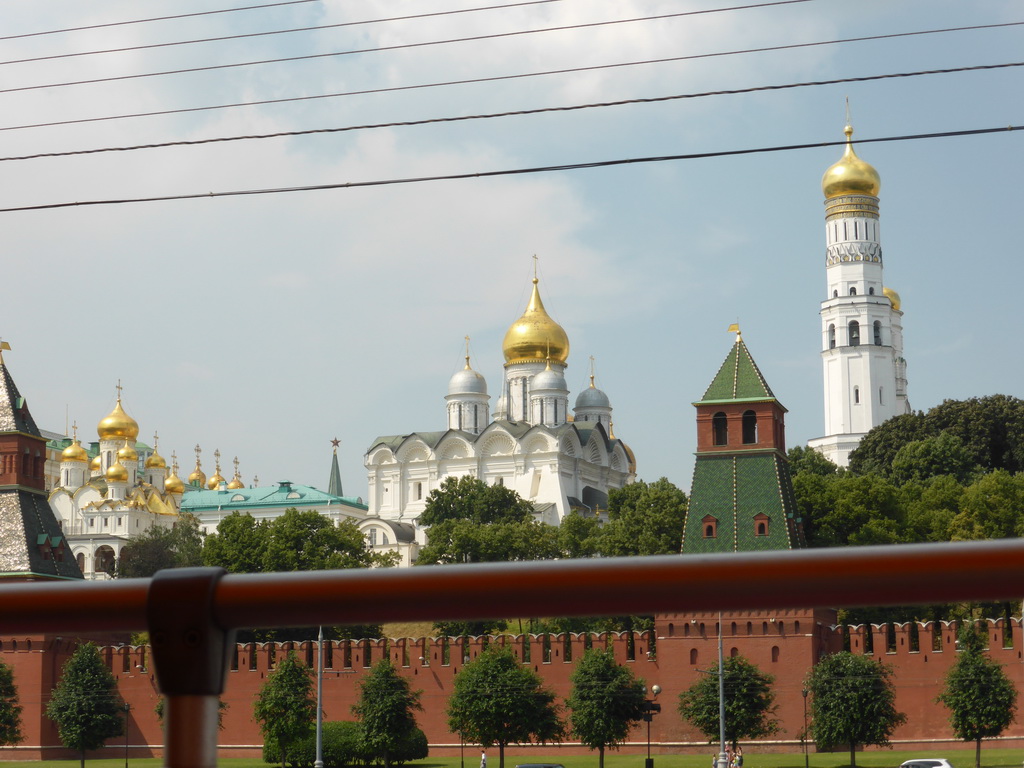 The Taynitskaya Tower, the Cathedral of the Annunciation, the Cathedral of the Archangel Michael, the Ivan the Great Bell Tower and the First Nameless Tower of the Moscow Kremlin, viewed from the sightseeing bus at the Sofiyskaya street