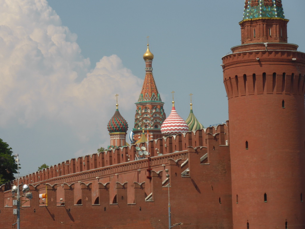 Southeast corner of the Moscow Kremlin and the towers of Saint Basil`s Cathedral, viewed from the sightseeing bus