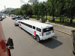 Limousine for a wedding party at Bolotnaya Square, viewed from the sightseeing bus