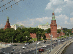 The Moscow Kremlin with the Vodovzvodnaya Tower, the Borovitskaya Tower, the Grand Kremlin Palace and the Cathedral of the Archangel Michael and the Kremlevskaya street, viewed from the sightseeing bus on the Bolshoy Kamenny Bridge