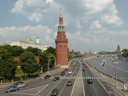 The Moscow Kremlin with the Vodovzvodnaya Tower, the Grand Kremlin Palace, the Cathedral of the Archangel Michael and the Ivan the Great Bell Tower, the Kremlevskaya street and the Moskva river, viewed from the sightseeing bus on the Bolshoy Kamenny Bridge